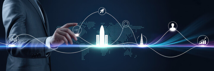 Businessman interacting with a digital interface showing business growth and success using modern technology for strategy and development