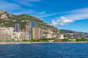 Picturesque cityscape of Monte Carlo with famous public beaches and spectacular modern skyscrapres,...