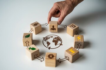 Hand places cube in circular economy: global resources flow