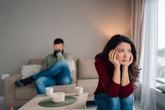 Fototapeta Couple facing relationship problems, experiencing conflict and distance