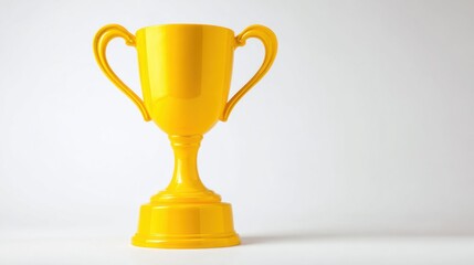 A vibrant yellow trophy stands tall reflecting success and celebration set against a simple background.