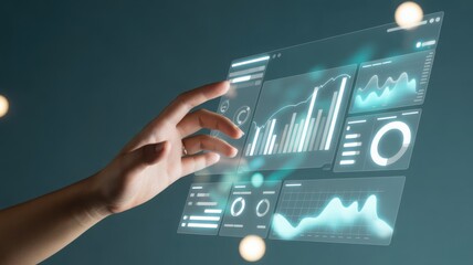 A person is interacting with a futuristic, transparent display featuring complex data visualizations and graphs