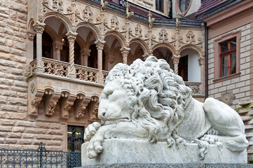 White lion statue at Moszna castle in Poland
