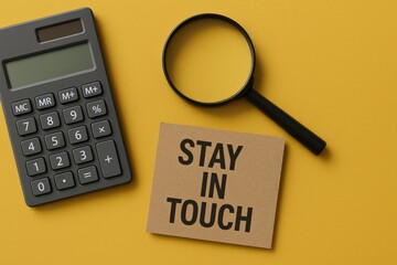 Stay In Touch Message with Calculator and Magnifying Glass on Yellow Background for Business Solutions