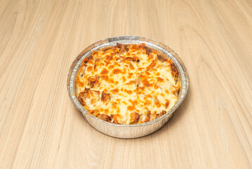 The crispy texture of the triple-baked potatoes is complemented by a fresh herb sauce that seeps into their interstices