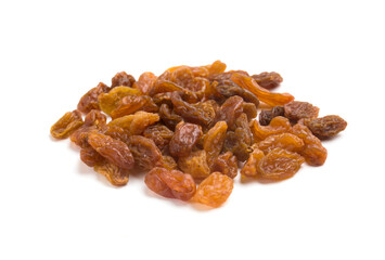 dried raisins on a white background