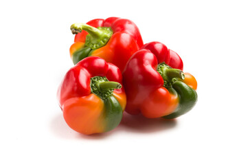 multi-colored peppers on a white background