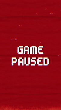 retro 8-bit GAME PAUSED message with glitch and static effects on a red background. Perfect for gaming streams, retro themes, or video overlays.