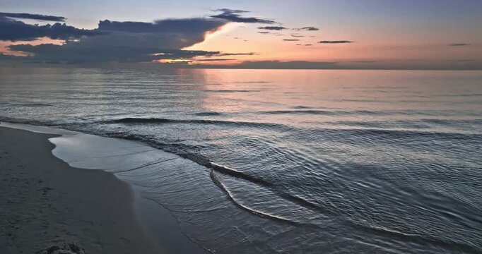 Calm golden sunset over Batlic sea in Poland.