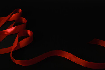 red ribbon symbol of World AIDS Day. Top view. Free copy space.