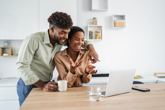 African american couple feeling surprised receiving good news