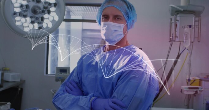 Standing surgeon wearing blue gown, cap, mask and gloves in operating room with waveform overlay