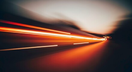 Long exposure of car light trails on a dark road at night, motion blur effect