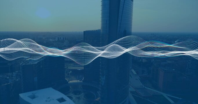 Highlighting reflective cylindrical skyscraper rising over downtown plaza, showing waveform overlay
