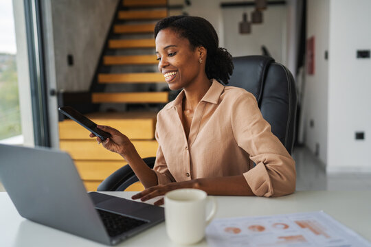 Young woman working remotely from home office