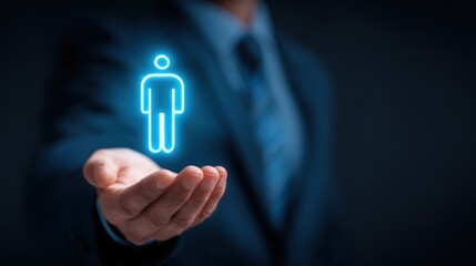 Businessman hand holding glowing blue human resource icon concept