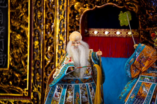 the essence of a Glove Puppetry (Budaixi) performance