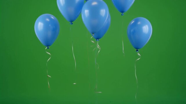 Blue balloons flying on a green screen