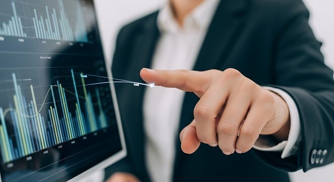 Business Executive Interacting with Digital Financial Data Charts on a Modern Screen