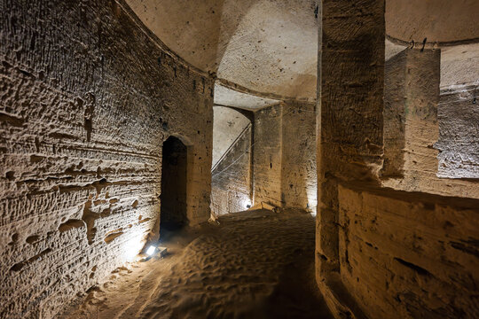 Inside the subterranean interior of the Kom El Shoqafa ancient Roman Catacombs, one of the Seven Wonders of the Medieval World, in Alexandria, Egypt.
