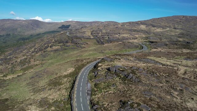 Aerial View of Road in Caha Mountains, Cork County, Ireland, Scenic Landscape on Sunny Day