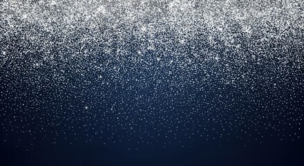 Falling silver glitter particles on a dark blue gradient background creating a sparkling festive and luxurious abstract texture
