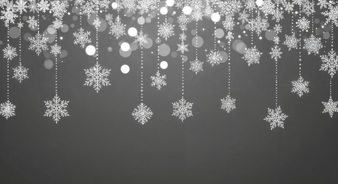 Elegant winter holiday background with sparkling white snowflakes and bokeh lights creating a festive top border on a dark grey backdrop