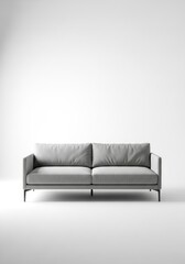 A grey modern two-seater sofa with textured fabric and dark legs stands against a plain white background in a studio setting