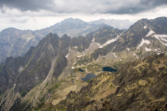 From Lomnick&yacute; &scaron;t&iacute;t, you can see the nearby Skalnat&eacute; pleso (Rocky Tarn) lake and the Mala Studena Valley and other high peaks like Ladovy Peak, Gerlachovsky Peak, Vysoka, and Krivan.