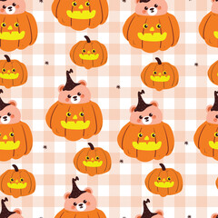 Naklejka premium seamless pattern cute cartoon bear inside halloween pumpkin in checkered background