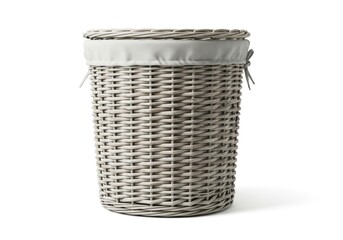Cylindrical light grey woven basket with a fabric liner and lid isolated
