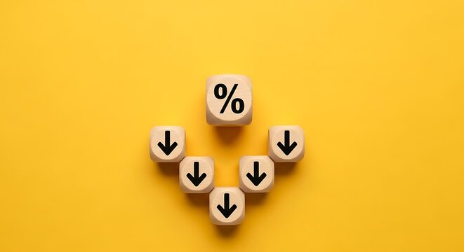 Wooden blocks showing a percentage sign and down arrows on yellow background