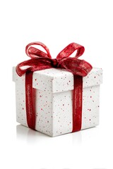 Christmas gift box decorated with red ribbon isolated on white