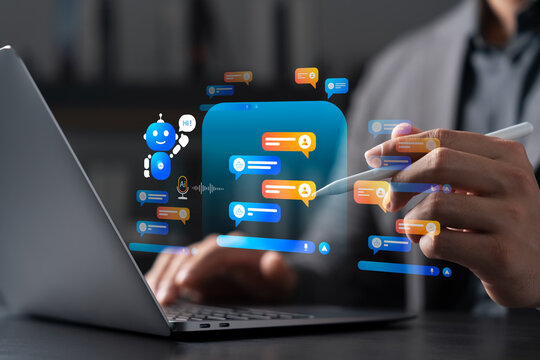 AI chatbot, businessman using laptop and stylus pen to interact with artificial intelligence chat window, intelligent communication, customer service, automation in the digital age.
