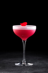 Red cocktail glass black background
