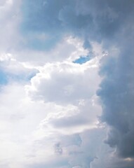 a beautiful, bright blue sky with fluffy white clouds, perfect for a background