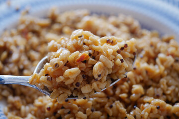 Delicious cooked grain served in a traditional dish