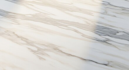 Obraz premium Elegant white marble texture with subtle gold and grey veining, offering a luxurious, natural surface for sophisticated interior design projects and high-end product showcases.