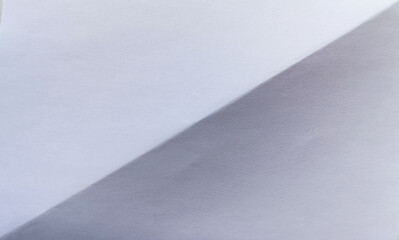 Soft diagonal shadows cast across smooth white paper texture, creating a minimal clean background perfect for design mockup, layout, or branding concept.