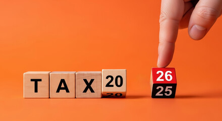 Tax 20 2026 year end christmas new year planning and finance concept with wooden block calendar changing from 25 to 26 evoking holiday season and business deadline urgency
