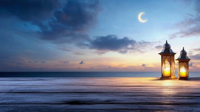 Two ornate, lit lanterns are placed on a wooden surface, with the ocean and a crescent moon visible in the twilight sky.