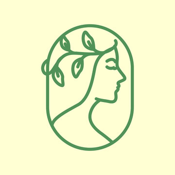 Elegant line art logo of a womans profile with a leafy branch in her hair.