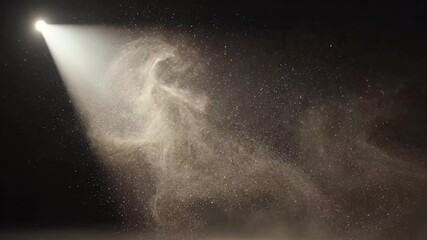 Mysterious beam of light from a spotlight revealing a swirling cloud of golden dust motes dancing in the darkness - Powered by Adobe