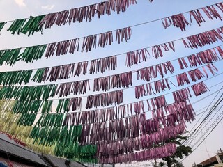 Colorful ribbons hanging in the sky, creating a festive and vibrant atmosphere