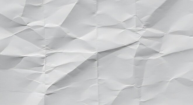 Crumpled white paper with textured folds and creases