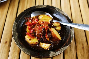 Spicy Indonesian sambal jengkol, made with chili and local spices, a unique traditional side dish from Indonesian cuisine.