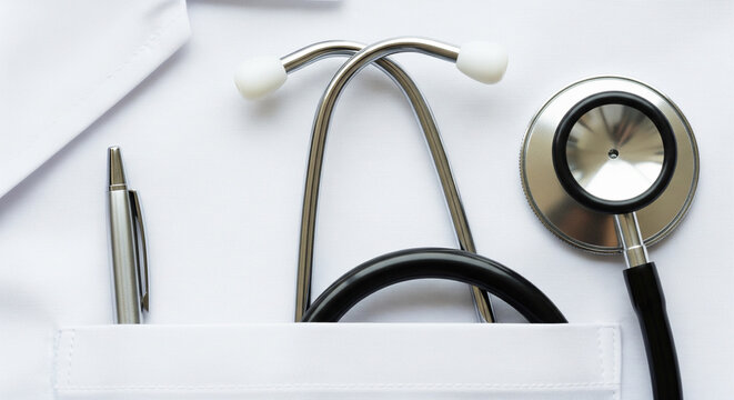 Close-up of Medical Equipment, Diagnostic Stethoscope and Pen Ready for Patient Examination - Powered by Adobe