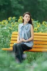 The girl in the sunflower garden