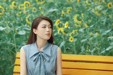 The girl in the sunflower garden