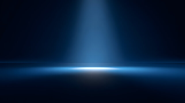 Dramatic blue spotlight illuminating a dark stage creating a captivating atmosphere